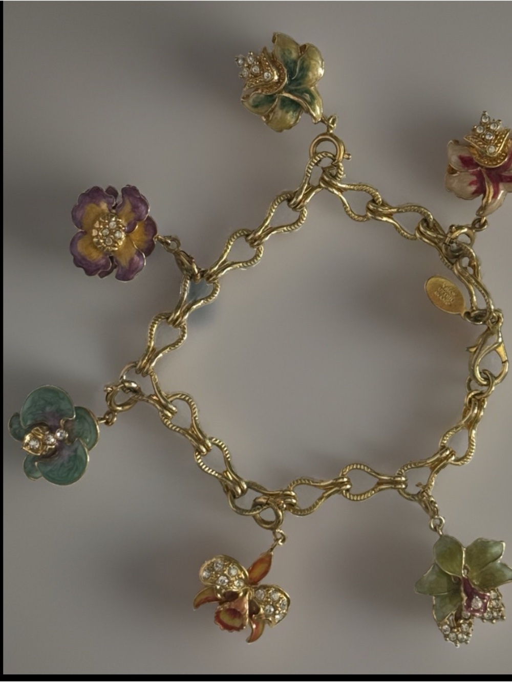 Vtg NOLAN MILLER Signed Gold Tone Charm Bracelet 6 Rhinestones Enamel Flowers